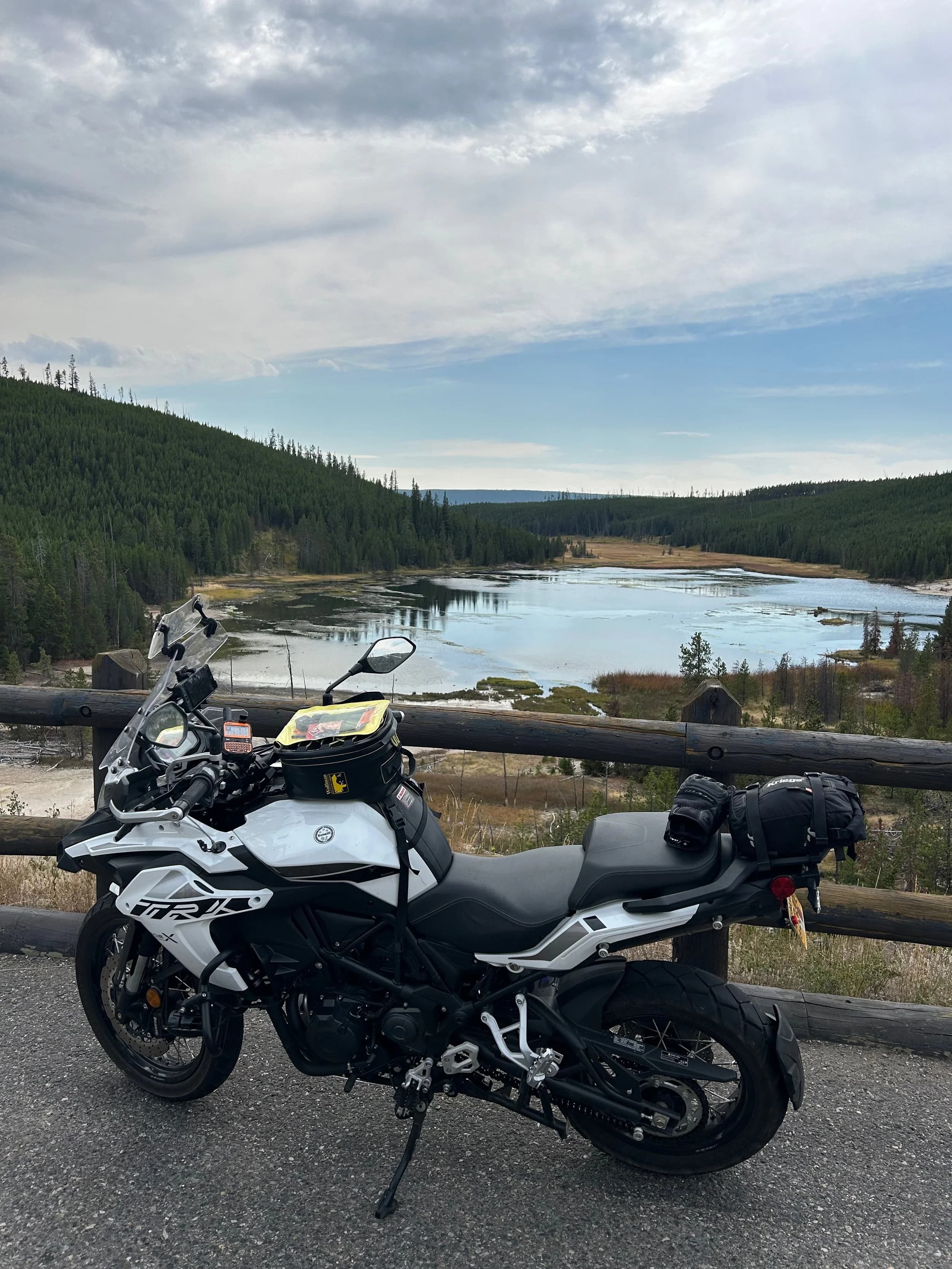 Trip Report: NW National Parks Loop
I left my job recently to take a much needed sabbatical and figure out what I’m doing next. A few weeks after my last day at work I embarked on what was to be a three week tour of NW-ish National Parks from Portland, to include Olympic, North Cascades, Glacier, Yellowstone, Grand Teton, Craters of the Moon, Lassen Volcanic, and Crater Lake.
I ended up missing Grand Tetons due to weather and I had to cut the trip short before I got to Lassen (family medical issue), so Lassen and Crater Lake remain unvisited.
Trip Dates: Sept 3 - Sept 16 (13 days)
Total Travel Miles: 3478 (does not include local miles for store runs, etc.)
Total Gallons of Gas Used: 82
Equipment: 2021 Benelli TRK502X Gaia GPS & Google Maps running on Sonim XP8 rugged Android phoneButler Motorcycle Maps (paper maps of best M/C roads in the country) iPhone 14 (main camera) Akaso Brave 7 helmet-mounted adventure camera Spot X satellite communicator and tracker Wolfman Luggage WP waterproof tank bag and saddle bags (no longer available) Watershed Colorado dry bag duffel (across the pillion seat) Kriega US-5 Drypack (tail bag) Kriega 3L hydration backpack (strapped to duffel, not worn)Marmot Ajax 2 tent Nemo hydrophobic down sleeping bag (non-mummy)Helinox ultralight cot MSR WhisperLite International stove
(Purchased in 1991 for my first moto trip: Detroit, MI to San Diego and back on an XT250)Gossamer Gear Bare Boxer bear-proof food canisters (two - one in each saddle bag)
Day 1 - Olympic National Park Date: Tuesday 9/3/2024
Destination: South Beach Campground, Olympic National Park
Travel Time: 4h 24m
Miles: 213Notes:
Planned to head west to Astoria then north from there, but left later than expected so headed up I-5 to US 12. I’ve driven/ridden that stretch of I-5 hundreds of times (starting in 1993). It’s boring and I hate it.
South Beach CG is first-come-first-served. I didn’t have issue getting a site. There is a long, tight loop of sites along the coastline, but I chose one of the sites further back near the bathrooms due to wind concerns. The bathroom building provided a sort of wind shelter for my site.
I used the heated grips on this leg; it was pretty chilly along the coast in the Olympic Peninsula. I almost didn’t install them, thinking I was being paranoid about the cold. I ended up using them a lot.
Day 2 - Ferry to Seattle / Burien Date: Wednesday 9/4/2024
Destination: Friend’s house in Burien, WA
Travel Time: 7h 30m
Miles: 199
Notes:
Slept well (thanks to Advil PM). I’ve not been sleeping well for more than a year. I’m really hoping to reset my sleep patterns with this trip. A good night’s sleep is one of my great joys and I feel like I’ve been robbed of that pleasure.
Used my Aeropress this morning for the first time ever. I’m hooked.
Headed up along US 101 through Port Angeles and then down to the Southworth ferry terminal near Port Orchard. Ferried across to Fauntleroy, which is just a few miles north my friend’s house in Burien. I’m always surprised at how long it takes to get from the Olympic Peninsula to the east side of Puget Sound (Seattle, etc.). With the ferry crossing (I love ferries) it took seven and a half hours to go 200 miles.
Discovered at my first stop of the day (just up 101 at the Kalaloch Campground, stopped to refill water) that the battery is quite weak and won’t start the bike if you leave the ignition on for even two minutes without the motor running. This would become a theme for the next few days. Fortunately, I have a jumper box and a permanent jump harness wired to the battery so jump starts are a quick operation.
Had a good evening with old friends.
Day 3 - North Cascades via Mountain Loop RoadDate: Thursday 9/5/2024
Destination: Newhalem Campground, North Cascades National Park
Travel Time: 4h 30m
Miles: 146Notes:
Slept well, on the couch. No pills needed.
I realized yesterday that my summer riding gloves (Rev’It Dune) were a size (or two) too small. Rev’It gloves fit really tight and I feel like I can never get it quite right. And yet, I love them. So, I stopped at a Cycle Gear in Bellevue to pick up something summer weight (Dirt 3) that fit better. They’re better, but maybe still one size too small. Such is life.
From Bellevue, I rode north and took the Mountain Loop Hwy then on up north to North Cascades. It was a hot ride. Still summer.
A small section of the Mountain Loop Road is dirt/gravel, which I didn’t realize. No biggie. Was just surprised (clearly I didn’t study my maps closely enough). When riding solo on a bike that weighs over 500 lbs., I tend to avoid planning much off-pavement riding. That’s what my DR-Z is for.
Day 4 - Newport, Washington via Winthrop Date: Friday 9/6/2024
Destination: Golden Spur Motor Inn, Newport, Washington
Travel Time: 8h
Miles: 308
Notes:
Slept just ok, even with Advil PM.
Pretty ride through North Cascades National Park and Colville National Forest. Didn’t do any backroads or hikes. Discovered (new to me) the town of Winthrop. Stopped for coffee at Sheri’s and resupplied on freeze-dried food at Cascades Outdoor Store.
The town of Newport is almost nothing, but, inexplicably, there’s an amazing restaurant (Brownell’s Place). Had dinner and a few ciders. Met and chatted with the owner/chef (she’s great). Listened to some live music. Then back to the motel.
Day 5 - New Battery in Kalispell Date: Saturday 9/7/2024
Destination: West Glacier KOA, West Glacier, MT
Travel Time: 8h 7m
Miles: 293
Notes:
Slept well on motel bed (on sleeping bag, not in the sheets). Another hot one.
Discovered that the water pump seal leaks oil. A quick post in the TRK Facebook group revealed that this is a common problem on this bike, and and easy fix. It’s apparently just a bad o-ring.
Battery has been getting continuously worse, and now requires I jump start the bike about every other start. Google Maps to the rescue: directions to the Batteries Plus in Kalispell, please. They don’t have an Odyssey AGM in the right size; the Duracell will have to do. (It’s been great.)
I set up camp at the West Glacier KOA, which will be my base for a few days. KOAs are their own little world. Very strange. Not really my thing, but the on-site laundry was handy.
After setting up camp I opened a cider and used the iPad to book a vehicle reservation for the next day to ride Going to the Sun Road, which I really wanted to do.
Day 6 - Going to the Sun RoadDate: Sunday 9/8/2024
Destination: Local Ride: West Glacier, Going to the Sun Road, Saint Mary, East Glacier
Travel Time: 5h 35m
Miles: 142Notes:
Quick breakfast and gas up in West Glacier before entering Going to the Sun Road.
Going to the Sun Road was stunning. This was the first point in the trip where I had tingles and was giddy at what I was seeing.
Took a very short hike along Saint Mary Lake. Again, I was beside myself with the beauty.
Lunch at the general store in Kiowa.
The rest of the ride back after East Glacier was meh, but I just kept thinking about how amazing what I’d seen in the morning had been.
Dinner at the KOA. Tacos from a cart (ok / not great, and a very weird guacamole) and a few glasses of wine from another cart. I asked about the guac and it turns out they make it in a food processor. Come on, people.
Day 7 - Ride to BozemanDate: Monday 9/9/2024
Destination: Friend’s house in Bozeman, Montana
Travel Time: ~ 8h (Gaia crashed near the end of the trip, but before getting to Bozeman)
Miles: ~ 400Notes:
Slept poorly again. No pills this time. Took some photos of my soft luggage setup to answer some questions in the TRK502X Facebook group. The saddle bags are from Wolfman Luggage, but I don’t think they make this waterproof line anymore. I use a duffel dry bag from Watershed across the top. A heat shield protects the side bag from exhaust heat.
Hazy, smoky ride most of the way. Very windy in places. This is where I first really started to feel how underpowered the TRK502 is. Really struggled in places.
Developed an engine-speed-sensitive squeak or rattle. Sounds like when a heat shield vibrates in resonance with engine vibration. Discovered that it’s a missing crash bar mounting bolt allowing the crash bar to rub against the frame.
Also noticed that there’s a resonant oscillation at speed that feels like the chain going bad (like it’s stretching unevenly).
First of several nights at a friend’s house in Bozeman (which, it turns out, is a pretty cool town). And there’s a hot tub…
Day 8 - Bike Maintenance & Hyalite ReservoirDate: Tuesday 9/10/2024
Destination: Local Ride: Hyalite Reservoir
Travel Time: not recorded
Miles: not recordedNotes:
Woke up to a smoky sunrise. I had the best night’s sleep I’ve had in years. This is was the whole point of this trip: to untangle my burnout and reclaim sleep as one of my joys. I wrote about it in my journal when I woke up. I hope this wasn’t a fluke.
Planned to replace the bolt that rattled loose from the crash bar, but instead discovered that it had actually severed off at the mount point. No fixing that on the road. Adjusted chain and moved on.
Lunch at Mountains Walking Brewery in Bozeman.
Rode up to Hyalite Reservoir. Pretty ride. Smoky still.
Soaked in hot tub after dinner.
Day 9 - North Yellowstone LoopDate: Wednesday 9/11/2024
Destination: Northern loop through Yellowstone National Park
Travel Time: 9h 36m
Miles: 272Notes:
Did a day trip from Bozeman down through the northern loop in Yellowstone, entering at Mammoth and taking the scenic route through Paradise Valley.
Saw elk, coyotes (I think), buffalo, and pronghorn.
Pretty ride, but cold in places. Used heated grips again.
Rode the loop through Mammoth Hot Springs (see video) at the end.
Coffee at Tumbleweed Bookstore & Cafe in Gardiner. I kind of dig Gardiner. Good vibe.
Had dinner at Mountains Walking Brewing. Rain and wind started. Lights flickered. Waited for rain to stop before riding back to the house.
Power out at the house due to high winds. This does not bode well for tomorrow.
Day 10 - Winter Weather in the ParksDate: Thursday 9/12/2024
Destination: Grand Teton National Park via West Yellowstone Pocatello, Idaho
Travel Time: 5h 40m
Miles: 201Notes:
Today was supposed to be a gorgeous ride through Yellowstone into Grand Teton National Park, and camping at Signal Mountain CG in the park. The weather had other ideas. It was pouring rain (and cold) all the way to West Yellowstone from Bozeman. By the time I got to West Yellowstone I was getting severe winter weather warnings on my phone calling for up to 3 (three!!) inches of snow accumulating in the high passes in the park. It’s bad enough in a car, but that’s a disaster waiting to happen on a motorcycle.
I parked my butt at Mountain Mama’s Cafe in West Yellowstone to warm up / dry off and decide what to do. I almost had myself convinced to push through when I realized that, even if I made it to the campground ok, I’d be setting up camp in the rain and I’d likely be miserable all night. Grand Teton would have to wait.
From West Yellowstone it’s easy to bail west into Idaho and get away from the park weather and elevations. So that’s what I did. It was not a pleasant ride, though. I was in torrential downpours all the way to Idaho Falls.
Arriving in Idaho Falls, I was exhausted and sure I could just find a room for the night. I dropped the bike at a roundabout (short-legged it coming to a stop; I knew it was going so I just rolled away). Guy behind me helped me pick it up. Then, there were no rooms because it was move in week for the two universities there (U of I, ISU). This would become a recurring theme.
I rode further to Blackfoot. Still no rooms.
I called ahead to Pocatello and got a room at a Red Lion there. I was never so happy to be off the bike.
No pictures this day. I couldn’t even get the action camera to turn on.
Day 11 - Craters of the Moon and EBR-1Date: Friday 9/13/2024
Destination: Craters of the Moon National Monument
Travel Time: 4h 20m
Miles: 124
Notes:
I wasn’t sure what my destination would be today but my plan was to do a little nuclear tourism, see Craters of the Moon, and then go somewhere from there. My schedule and day-plan was thrown off by missing Grand Teton National Park and spending a night in Pocatello, which was not on the itinerary at all.
Stopped in Atomic City. Not sure why; I was under the impression that Atomic City was the first city lit by nuclear engergy, but it was practically a ghost town. There are a few houses there, but as far as I could tell all of the business were shuttered. Except, maybe, for the race track; that looked like it might still get used.
Arco, it turns out, is the city celebrated as the first in the world to be lit by nuclear energy. Nothing special about the town, but they do a nice job of making City Hall photo-worthy.
Between Atomic City and Arco is EBR-1 (Experimental Breeder Reactor I) which was the world’s first breeder reactor. The EBR-1 exhibit was closed for the season, but in the lot next to it were some really interesting experimental nuclear heat-transfer jet engines that never made it out of the experimental phase (probably a good thing).
Craters of the Moon is pretty small. If you don’t do any of the walks, it’s literally just a 30 minute road loop. Still, it was an unexpected surprise and delight. I had no idea what to expect but I was positively chuffed at the experience. I noticed that the campground had open sites so I inquired at the entry booth. As luck would have it, the whole campground is first come / first serve. I decided to set up for the night. It’s good to be done early and have some time to read and not stress about making distance.
Day 12 - New Chain in Twin FallsDate: Saturday 9/14/2024
Destination: Battle Mountain, Nevada
Travel Time: 8h 52m
Miles: 335
Notes:
Beautiful morning in Craters of the Moon. While I was breaking camp a parade of classic cars came into the park to drive the loop. I got a picture of one Pontiac down the road in Carey at a gas station.
Carey ended up being an unplanned fork in the road for me. I discovered this morning that my chain was indeed stretching unevenly, and the oscillation I was feeling and hearing was the chain hum changing from a “loose” hum to a “tight” hum rapidly as the tight spot moved around the sprockets. I was supposed to continue west to Mountain Home and then south from there into Nevada. A very scenic route, according to my Butler map. But, between camp and the gas station I got pretty paranoid about the chain snapping at high speed, which, worst case, could lead to a fatal crash.
So I called ahead to a few motorcycle dealers in Mountain Home (on my planned route) to see if they could take me in and replace the chain. No dice. This is the downside of having an obscure motorcycle from an obscure marque - no one wants to work on it. Making matters worse this is an Italian-designed bike built in China, a fact which causes many people to lose the ability to think clearly. “It’s Chinese junk!” Not so. Next.
With Mountain Home out, I tried Twin Falls. My first call was to Adventure Motorsports, and the service manager there took me in with no hesitation. “How soon can you be here?” I didn’t get his name, but my hat’s off to him and his one tech working furiously on a Saturday to beat the 3pm closing time. He said during high season, they get about 15-20 out of town travelers per week who need something done, and they take them all in. I love to hear stuff like this. This shop is in it for the community. They have a nice showroom, too.
With a quality new chain installed, I got a burrito and a MexiCoke at a Mexican place and went on my way. I made it to Battle Mountain, NV, where I decide to get a room. Tomorrow I rejoin my planned scenic route. Day 13 - Desert Mountains in NV, CADate: Sunday 9/15/2024
Destination: Grizzly Campground, Lake Davis (near Portola, CA)
Travel Time: 7h
Miles: 307
Notes:
I love the northern Nevada landscape, and today’s ride didn’t disappoint. US Highway 50 is apparently known as “The Loneliest Highway” but everyone knows about it, so it’s not very lonely. However, after leaving Austin, NV headed west you can take Nevada Highway 722, which dips to the south and follows the old US 50 route. It was completely empty and the twisties through the passes were fun. Highly recommended.
Stopped in Fallon for gas and to find a Micro SD card for the action camera. Walmart to the rescue.
After Reno, I crossed into California and, I swear, it looks different. Norther California desert mountains are so beautiful.
Camped at a nearly empty campground on Lake Davis (very end of the season). The host warned me rain was coming tomorrow.
Day 14 - Unplanned Return HomeDate: Monday 9/16/2024
Destination: Summit Lake Campground, Lassen Volcanic National Park Portland, Oregon (Home)
Travel Time: 10h 32m
Miles: 538Notes:
Last week, my mom went into the hospital for a fairly routine procedure. My brother went to Michigan to help out, as needed, and he went back home to Arizona after she returned home and everything seemed settled.
This morning, while having coffee, I got a call that she’d gone back into the hospital with something that may or may not have been related to the procedure. It seemed like maybe things were ok, but maybe not.
I decided the best thing to do was head home so that I was near an airport if I needed to fly out to Michigan to help out.
I packed up camp and headed up US 395 toward home, via Klamath Falls. It was a pretty ride, but, once again, I found myself in rain most of the way to Klamath Falls.
I was pretty beat by the time I got to Klamath Falls and figured I’d just find a hotel room, get a hot shower, and finish the ride tomorrow.
But, once again, it was move-in week for the local university. Holiday Inn Express had a single room for $395. No thanks. Onward.
I never hit rain again after Klamath Falls, and after turning west onto Oregon Hwy 58 and starting to lose elevation into the Willamette Valley, the temperature starting rising, which was welcome.
Once I reached Eugene, there was no point in not just going all the way home, so that’s what I did.
I got two pictures: one at camp before the call, and one at my last gas stop, an hour and twenty minutes from home, with the moon rising.
A nice side effect of my early return home is that I was home for my birthday (tomorrow), so I had dinner with my kids and my wife, which was lovely.
I did end up flying to Michigan the next day, and was there for a bit. The best part? I got to make some meals for my mom and step dad. Everything seems ok with my mom for now.
Grand Teton, Lassen, and Crater Lake will be there, and now I have an excuse for another trip in the future.