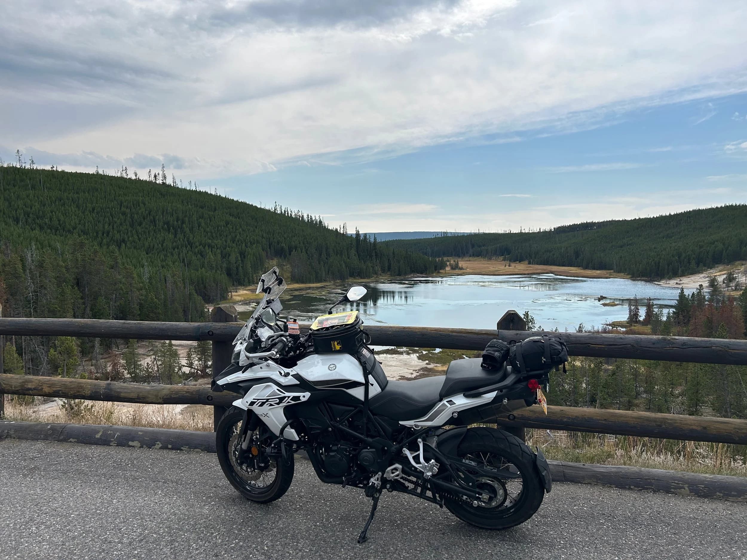 Trip Report: NW National Parks Loop
I left my job recently to take a much needed sabbatical and figure out what I’m doing next. A few weeks after my last day at work I embarked on what was to be a three week tour of NW-ish National Parks from Portland, to include Olympic, North Cascades, Glacier, Yellowstone, Grand Teton, Craters of the Moon, Lassen Volcanic, and Crater Lake.
I ended up missing Grand Tetons due to weather and I had to cut the trip short before I got to Lassen (family medical issue), so Lassen and Crater Lake remain unvisited.
Trip Dates: Sept 3 - Sept 16 (13 days)
Total Travel Miles: 3478 (does not include local miles for store runs, etc.)
Total Gallons of Gas Used: 82
Equipment: 2021 Benelli TRK502X Gaia GPS & Google Maps running on Sonim XP8 rugged Android phoneButler Motorcycle Maps (paper maps of best M/C roads in the country) iPhone 14 (main camera) Akaso Brave 7 helmet-mounted adventure camera Spot X satellite communicator and tracker Wolfman Luggage WP waterproof tank bag and saddle bags (no longer available) Watershed Colorado dry bag duffel (across the pillion seat) Kriega US-5 Drypack (tail bag) Kriega 3L hydration backpack (strapped to duffel, not worn)Marmot Ajax 2 tent Nemo hydrophobic down sleeping bag (non-mummy)Helinox ultralight cot MSR WhisperLite International stove
(Purchased in 1991 for my first moto trip: Detroit, MI to San Diego and back on an XT250)Gossamer Gear Bare Boxer bear-proof food canisters (two - one in each saddle bag)
Day 1 - Olympic National Park Date: Tuesday 9/3/2024
Destination: South Beach Campground, Olympic National Park
Travel Time: 4h 24m
Miles: 213Notes:
Planned to head west to Astoria then north from there, but left later than expected so headed up I-5 to US 12. I’ve driven/ridden that stretch of I-5 hundreds of times (starting in 1993). It’s boring and I hate it.
South Beach CG is first-come-first-served. I didn’t have issue getting a site. There is a long, tight loop of sites along the coastline, but I chose one of the sites further back near the bathrooms due to wind concerns. The bathroom building provided a sort of wind shelter for my site.
I used the heated grips on this leg; it was pretty chilly along the coast in the Olympic Peninsula. I almost didn’t install them, thinking I was being paranoid about the cold. I ended up using them a lot.
Day 2 - Ferry to Seattle / Burien Date: Wednesday 9/4/2024
Destination: Friend’s house in Burien, WA
Travel Time: 7h 30m
Miles: 199
Notes:
Slept well (thanks to Advil PM). I’ve not been sleeping well for more than a year. I’m really hoping to reset my sleep patterns with this trip. A good night’s sleep is one of my great joys and I feel like I’ve been robbed of that pleasure.
Used my Aeropress this morning for the first time ever. I’m hooked.
Headed up along US 101 through Port Angeles and then down to the Southworth ferry terminal near Port Orchard. Ferried across to Fauntleroy, which is just a few miles north my friend’s house in Burien. I’m always surprised at how long it takes to get from the Olympic Peninsula to the east side of Puget Sound (Seattle, etc.). With the ferry crossing (I love ferries) it took seven and a half hours to go 200 miles.
Discovered at my first stop of the day (just up 101 at the Kalaloch Campground, stopped to refill water) that the battery is quite weak and won’t start the bike if you leave the ignition on for even two minutes without the motor running. This would become a theme for the next few days. Fortunately, I have a jumper box and a permanent jump harness wired to the battery so jump starts are a quick operation.
Had a good evening with old friends.
Day 3 - North Cascades via Mountain Loop RoadDate: Thursday 9/5/2024
Destination: Newhalem Campground, North Cascades National Park
Travel Time: 4h 30m
Miles: 146Notes:
Slept well, on the couch. No pills needed.
I realized yesterday that my summer riding gloves (Rev’It Dune) were a size (or two) too small. Rev’It gloves fit really tight and I feel like I can never get it quite right. And yet, I love them. So, I stopped at a Cycle Gear in Bellevue to pick up something summer weight (Dirt 3) that fit better. They’re better, but maybe still one size too small. Such is life.
From Bellevue, I rode north and took the Mountain Loop Hwy then on up north to North Cascades. It was a hot ride. Still summer.
A small section of the Mountain Loop Road is dirt/gravel, which I didn’t realize. No biggie. Was just surprised (clearly I didn’t study my maps closely enough). When riding solo on a bike that weighs over 500 lbs., I tend to avoid planning much off-pavement riding. That’s what my DR-Z is for.
Day 4 - Newport, Washington via Winthrop Date: Friday 9/6/2024
Destination: Golden Spur Motor Inn, Newport, Washington
Travel Time: 8h
Miles: 308
Notes:
Slept just ok, even with Advil PM.
Pretty ride through North Cascades National Park and Colville National Forest. Didn’t do any backroads or hikes. Discovered (new to me) the town of Winthrop. Stopped for coffee at Sheri’s and resupplied on freeze-dried food at Cascades Outdoor Store.
The town of Newport is almost nothing, but, inexplicably, there’s an amazing restaurant (Brownell’s Place). Had dinner and a few ciders. Met and chatted with the owner/chef (she’s great). Listened to some live music. Then back to the motel.
Day 5 - New Battery in Kalispell Date: Saturday 9/7/2024
Destination: West Glacier KOA, West Glacier, MT
Travel Time: 8h 7m
Miles: 293
Notes:
Slept well on motel bed (on sleeping bag, not in the sheets). Another hot one.
Discovered that the water pump seal leaks oil. A quick post in the TRK Facebook group revealed that this is a common problem on this bike, and and easy fix. It’s apparently just a bad o-ring.
Battery has been getting continuously worse, and now requires I jump start the bike about every other start. Google Maps to the rescue: directions to the Batteries Plus in Kalispell, please. They don’t have an Odyssey AGM in the right size; the Duracell will have to do. (It’s been great.)
I set up camp at the West Glacier KOA, which will be my base for a few days. KOAs are their own little world. Very strange. Not really my thing, but the on-site laundry was handy.
After setting up camp I opened a cider and used the iPad to book a vehicle reservation for the next day to ride Going to the Sun Road, which I really wanted to do.
Day 6 - Going to the Sun RoadDate: Sunday 9/8/2024
Destination: Local Ride: West Glacier, Going to the Sun Road, Saint Mary, East Glacier
Travel Time: 5h 35m
Miles: 142Notes:
Quick breakfast and gas up in West Glacier before entering Going to the Sun Road.
Going to the Sun Road was stunning. This was the first point in the trip where I had tingles and was giddy at what I was seeing.
Took a very short hike along Saint Mary Lake. Again, I was beside myself with the beauty.
Lunch at the general store in Kiowa.
The rest of the ride back after East Glacier was meh, but I just kept thinking about how amazing what I’d seen in the morning had been.
Dinner at the KOA. Tacos from a cart (ok / not great, and a very weird guacamole) and a few glasses of wine from another cart. I asked about the guac and it turns out they make it in a food processor. Come on, people.
Day 7 - Ride to BozemanDate: Monday 9/9/2024
Destination: Friend’s house in Bozeman, Montana
Travel Time: ~ 8h (Gaia crashed near the end of the trip, but before getting to Bozeman)
Miles: ~ 400Notes:
Slept poorly again. No pills this time. Took some photos of my soft luggage setup to answer some questions in the TRK502X Facebook group. The saddle bags are from Wolfman Luggage, but I don’t think they make this waterproof line anymore. I use a duffel dry bag from Watershed across the top. A heat shield protects the side bag from exhaust heat.
Hazy, smoky ride most of the way. Very windy in places. This is where I first really started to feel how underpowered the TRK502 is. Really struggled in places.
Developed an engine-speed-sensitive squeak or rattle. Sounds like when a heat shield vibrates in resonance with engine vibration. Discovered that it’s a missing crash bar mounting bolt allowing the crash bar to rub against the frame.
Also noticed that there’s a resonant oscillation at speed that feels like the chain going bad (like it’s stretching unevenly).
First of several nights at a friend’s house in Bozeman (which, it turns out, is a pretty cool town). And there’s a hot tub…
Day 8 - Bike Maintenance & Hyalite ReservoirDate: Tuesday 9/10/2024
Destination: Local Ride: Hyalite Reservoir
Travel Time: not recorded
Miles: not recordedNotes:
Woke up to a smoky sunrise. I had the best night’s sleep I’ve had in years. This is was the whole point of this trip: to untangle my burnout and reclaim sleep as one of my joys. I wrote about it in my journal when I woke up. I hope this wasn’t a fluke.
Planned to replace the bolt that rattled loose from the crash bar, but instead discovered that it had actually severed off at the mount point. No fixing that on the road. Adjusted chain and moved on.
Lunch at Mountains Walking Brewery in Bozeman.
Rode up to Hyalite Reservoir. Pretty ride. Smoky still.
Soaked in hot tub after dinner.
Day 9 - North Yellowstone LoopDate: Wednesday 9/11/2024
Destination: Northern loop through Yellowstone National Park
Travel Time: 9h 36m
Miles: 272Notes:
Did a day trip from Bozeman down through the northern loop in Yellowstone, entering at Mammoth and taking the scenic route through Paradise Valley.
Saw elk, coyotes (I think), buffalo, and pronghorn.
Pretty ride, but cold in places. Used heated grips again.
Rode the loop through Mammoth Hot Springs (see video) at the end.
Coffee at Tumbleweed Bookstore & Cafe in Gardiner. I kind of dig Gardiner. Good vibe.
Had dinner at Mountains Walking Brewing. Rain and wind started. Lights flickered. Waited for rain to stop before riding back to the house.
Power out at the house due to high winds. This does not bode well for tomorrow.
Day 10 - Winter Weather in the ParksDate: Thursday 9/12/2024
Destination: Grand Teton National Park via West Yellowstone Pocatello, Idaho
Travel Time: 5h 40m
Miles: 201Notes:
Today was supposed to be a gorgeous ride through Yellowstone into Grand Teton National Park, and camping at Signal Mountain CG in the park. The weather had other ideas. It was pouring rain (and cold) all the way to West Yellowstone from Bozeman. By the time I got to West Yellowstone I was getting severe winter weather warnings on my phone calling for up to 3 (three!!) inches of snow accumulating in the high passes in the park. It’s bad enough in a car, but that’s a disaster waiting to happen on a motorcycle.
I parked my butt at Mountain Mama’s Cafe in West Yellowstone to warm up / dry off and decide what to do. I almost had myself convinced to push through when I realized that, even if I made it to the campground ok, I’d be setting up camp in the rain and I’d likely be miserable all night. Grand Teton would have to wait.
From West Yellowstone it’s easy to bail west into Idaho and get away from the park weather and elevations. So that’s what I did. It was not a pleasant ride, though. I was in torrential downpours all the way to Idaho Falls.
Arriving in Idaho Falls, I was exhausted and sure I could just find a room for the night. I dropped the bike at a roundabout (short-legged it coming to a stop; I knew it was going so I just rolled away). Guy behind me helped me pick it up. Then, there were no rooms because it was move in week for the two universities there (U of I, ISU). This would become a recurring theme.
I rode further to Blackfoot. Still no rooms.
I called ahead to Pocatello and got a room at a Red Lion there. I was never so happy to be off the bike.
No pictures this day. I couldn’t even get the action camera to turn on.
Day 11 - Craters of the Moon and EBR-1Date: Friday 9/13/2024
Destination: Craters of the Moon National Monument
Travel Time: 4h 20m
Miles: 124
Notes:
I wasn’t sure what my destination would be today but my plan was to do a little nuclear tourism, see Craters of the Moon, and then go somewhere from there. My schedule and day-plan was thrown off by missing Grand Teton National Park and spending a night in Pocatello, which was not on the itinerary at all.
Stopped in Atomic City. Not sure why; I was under the impression that Atomic City was the first city lit by nuclear engergy, but it was practically a ghost town. There are a few houses there, but as far as I could tell all of the business were shuttered. Except, maybe, for the race track; that looked like it might still get used.
Arco, it turns out, is the city celebrated as the first in the world to be lit by nuclear energy. Nothing special about the town, but they do a nice job of making City Hall photo-worthy.
Between Atomic City and Arco is EBR-1 (Experimental Breeder Reactor I) which was the world’s first breeder reactor. The EBR-1 exhibit was closed for the season, but in the lot next to it were some really interesting experimental nuclear heat-transfer jet engines that never made it out of the experimental phase (probably a good thing).
Craters of the Moon is pretty small. If you don’t do any of the walks, it’s literally just a 30 minute road loop. Still, it was an unexpected surprise and delight. I had no idea what to expect but I was positively chuffed at the experience. I noticed that the campground had open sites so I inquired at the entry booth. As luck would have it, the whole campground is first come / first serve. I decided to set up for the night. It’s good to be done early and have some time to read and not stress about making distance.
Day 12 - New Chain in Twin FallsDate: Saturday 9/14/2024
Destination: Battle Mountain, Nevada
Travel Time: 8h 52m
Miles: 335
Notes:
Beautiful morning in Craters of the Moon. While I was breaking camp a parade of classic cars came into the park to drive the loop. I got a picture of one Pontiac down the road in Carey at a gas station.
Carey ended up being an unplanned fork in the road for me. I discovered this morning that my chain was indeed stretching unevenly, and the oscillation I was feeling and hearing was the chain hum changing from a “loose” hum to a “tight” hum rapidly as the tight spot moved around the sprockets. I was supposed to continue west to Mountain Home and then south from there into Nevada. A very scenic route, according to my Butler map. But, between camp and the gas station I got pretty paranoid about the chain snapping at high speed, which, worst case, could lead to a fatal crash.
So I called ahead to a few motorcycle dealers in Mountain Home (on my planned route) to see if they could take me in and replace the chain. No dice. This is the downside of having an obscure motorcycle from an obscure marque - no one wants to work on it. Making matters worse this is an Italian-designed bike built in China, a fact which causes many people to lose the ability to think clearly. “It’s Chinese junk!” Not so. Next.
With Mountain Home out, I tried Twin Falls. My first call was to Adventure Motorsports, and the service manager there took me in with no hesitation. “How soon can you be here?” I didn’t get his name, but my hat’s off to him and his one tech working furiously on a Saturday to beat the 3pm closing time. He said during high season, they get about 15-20 out of town travelers per week who need something done, and they take them all in. I love to hear stuff like this. This shop is in it for the community. They have a nice showroom, too.
With a quality new chain installed, I got a burrito and a MexiCoke at a Mexican place and went on my way. I made it to Battle Mountain, NV, where I decide to get a room. Tomorrow I rejoin my planned scenic route. Day 13 - Desert Mountains in NV, CADate: Sunday 9/15/2024
Destination: Grizzly Campground, Lake Davis (near Portola, CA)
Travel Time: 7h
Miles: 307
Notes:
I love the northern Nevada landscape, and today’s ride didn’t disappoint. US Highway 50 is apparently known as “The Loneliest Highway” but everyone knows about it, so it’s not very lonely. However, after leaving Austin, NV headed west you can take Nevada Highway 722, which dips to the south and follows the old US 50 route. It was completely empty and the twisties through the passes were fun. Highly recommended.
Stopped in Fallon for gas and to find a Micro SD card for the action camera. Walmart to the rescue.
After Reno, I crossed into California and, I swear, it looks different. Norther California desert mountains are so beautiful.
Camped at a nearly empty campground on Lake Davis (very end of the season). The host warned me rain was coming tomorrow.
Day 14 - Unplanned Return HomeDate: Monday 9/16/2024
Destination: Summit Lake Campground, Lassen Volcanic National Park Portland, Oregon (Home)
Travel Time: 10h 32m
Miles: 538Notes:
Last week, my mom went into the hospital for a fairly routine procedure. My brother went to Michigan to help out, as needed, and he went back home to Arizona after she returned home and everything seemed settled.
This morning, while having coffee, I got a call that she’d gone back into the hospital with something that may or may not have been related to the procedure. It seemed like maybe things were ok, but maybe not.
I decided the best thing to do was head home so that I was near an airport if I needed to fly out to Michigan to help out.
I packed up camp and headed up US 395 toward home, via Klamath Falls. It was a pretty ride, but, once again, I found myself in rain most of the way to Klamath Falls.
I was pretty beat by the time I got to Klamath Falls and figured I’d just find a hotel room, get a hot shower, and finish the ride tomorrow.
But, once again, it was move-in week for the local university. Holiday Inn Express had a single room for $395. No thanks. Onward.
I never hit rain again after Klamath Falls, and after turning west onto Oregon Hwy 58 and starting to lose elevation into the Willamette Valley, the temperature starting rising, which was welcome.
Once I reached Eugene, there was no point in not just going all the way home, so that’s what I did.
I got two pictures: one at camp before the call, and one at my last gas stop, an hour and twenty minutes from home, with the moon rising.
A nice side effect of my early return home is that I was home for my birthday (tomorrow), so I had dinner with my kids and my wife, which was lovely.
I did end up flying to Michigan the next day, and was there for a bit. The best part? I got to make some meals for my mom and step dad. Everything seems ok with my mom for now.
Grand Teton, Lassen, and Crater Lake will be there, and now I have an excuse for another trip in the future.