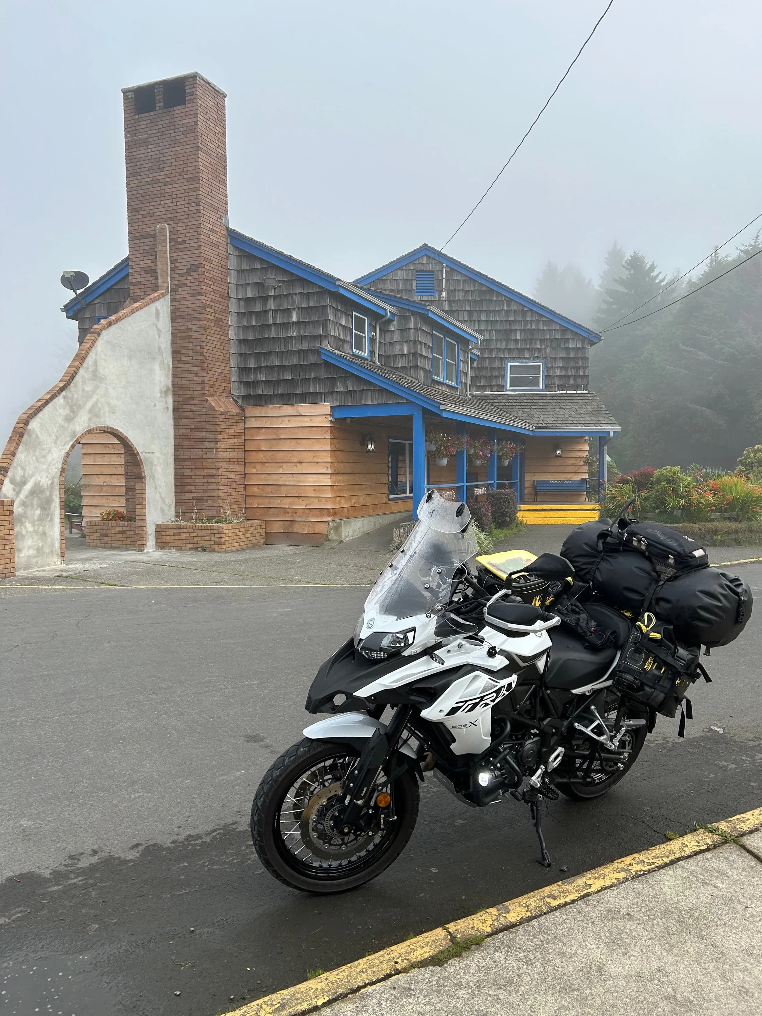 Trip Report: NW National Parks Loop
I left my job recently to take a much needed sabbatical and figure out what I’m doing next. A few weeks after my last day at work I embarked on what was to be a three week tour of NW-ish National Parks from Portland, to include Olympic, North Cascades, Glacier, Yellowstone, Grand Teton, Craters of the Moon, Lassen Volcanic, and Crater Lake.
I ended up missing Grand Tetons due to weather and I had to cut the trip short before I got to Lassen (family medical issue), so Lassen and Crater Lake remain unvisited.
Trip Dates: Sept 3 - Sept 16 (13 days)
Total Travel Miles: 3478 (does not include local miles for store runs, etc.)
Total Gallons of Gas Used: 82
Equipment: 2021 Benelli TRK502X Gaia GPS & Google Maps running on Sonim XP8 rugged Android phoneButler Motorcycle Maps (paper maps of best M/C roads in the country) iPhone 14 (main camera) Akaso Brave 7 helmet-mounted adventure camera Spot X satellite communicator and tracker Wolfman Luggage WP waterproof tank bag and saddle bags (no longer available) Watershed Colorado dry bag duffel (across the pillion seat) Kriega US-5 Drypack (tail bag) Kriega 3L hydration backpack (strapped to duffel, not worn)Marmot Ajax 2 tent Nemo hydrophobic down sleeping bag (non-mummy)Helinox ultralight cot MSR WhisperLite International stove
(Purchased in 1991 for my first moto trip: Detroit, MI to San Diego and back on an XT250)Gossamer Gear Bare Boxer bear-proof food canisters (two - one in each saddle bag)
Day 1 - Olympic National Park Date: Tuesday 9/3/2024
Destination: South Beach Campground, Olympic National Park
Travel Time: 4h 24m
Miles: 213Notes:
Planned to head west to Astoria then north from there, but left later than expected so headed up I-5 to US 12. I’ve driven/ridden that stretch of I-5 hundreds of times (starting in 1993). It’s boring and I hate it.
South Beach CG is first-come-first-served. I didn’t have issue getting a site. There is a long, tight loop of sites along the coastline, but I chose one of the sites further back near the bathrooms due to wind concerns. The bathroom building provided a sort of wind shelter for my site.
I used the heated grips on this leg; it was pretty chilly along the coast in the Olympic Peninsula. I almost didn’t install them, thinking I was being paranoid about the cold. I ended up using them a lot.
Day 2 - Ferry to Seattle / Burien Date: Wednesday 9/4/2024
Destination: Friend’s house in Burien, WA
Travel Time: 7h 30m
Miles: 199
Notes:
Slept well (thanks to Advil PM). I’ve not been sleeping well for more than a year. I’m really hoping to reset my sleep patterns with this trip. A good night’s sleep is one of my great joys and I feel like I’ve been robbed of that pleasure.
Used my Aeropress this morning for the first time ever. I’m hooked.
Headed up along US 101 through Port Angeles and then down to the Southworth ferry terminal near Port Orchard. Ferried across to Fauntleroy, which is just a few miles north my friend’s house in Burien. I’m always surprised at how long it takes to get from the Olympic Peninsula to the east side of Puget Sound (Seattle, etc.). With the ferry crossing (I love ferries) it took seven and a half hours to go 200 miles.
Discovered at my first stop of the day (just up 101 at the Kalaloch Campground, stopped to refill water) that the battery is quite weak and won’t start the bike if you leave the ignition on for even two minutes without the motor running. This would become a theme for the next few days. Fortunately, I have a jumper box and a permanent jump harness wired to the battery so jump starts are a quick operation.
Had a good evening with old friends.
Day 3 - North Cascades via Mountain Loop RoadDate: Thursday 9/5/2024
Destination: Newhalem Campground, North Cascades National Park
Travel Time: 4h 30m
Miles: 146Notes:
Slept well, on the couch. No pills needed.
I realized yesterday that my summer riding gloves (Rev’It Dune) were a size (or two) too small. Rev’It gloves fit really tight and I feel like I can never get it quite right. And yet, I love them. So, I stopped at a Cycle Gear in Bellevue to pick up something summer weight (Dirt 3) that fit better. They’re better, but maybe still one size too small. Such is life.
From Bellevue, I rode north and took the Mountain Loop Hwy then on up north to North Cascades. It was a hot ride. Still summer.
A small section of the Mountain Loop Road is dirt/gravel, which I didn’t realize. No biggie. Was just surprised (clearly I didn’t study my maps closely enough). When riding solo on a bike that weighs over 500 lbs., I tend to avoid planning much off-pavement riding. That’s what my DR-Z is for.
Day 4 - Newport, Washington via Winthrop Date: Friday 9/6/2024
Destination: Golden Spur Motor Inn, Newport, Washington
Travel Time: 8h
Miles: 308
Notes:
Slept just ok, even with Advil PM.
Pretty ride through North Cascades National Park and Colville National Forest. Didn’t do any backroads or hikes. Discovered (new to me) the town of Winthrop. Stopped for coffee at Sheri’s and resupplied on freeze-dried food at Cascades Outdoor Store.
The town of Newport is almost nothing, but, inexplicably, there’s an amazing restaurant (Brownell’s Place). Had dinner and a few ciders. Met and chatted with the owner/chef (she’s great). Listened to some live music. Then back to the motel.
Day 5 - New Battery in Kalispell Date: Saturday 9/7/2024
Destination: West Glacier KOA, West Glacier, MT
Travel Time: 8h 7m
Miles: 293
Notes:
Slept well on motel bed (on sleeping bag, not in the sheets). Another hot one.
Discovered that the water pump seal leaks oil. A quick post in the TRK Facebook group revealed that this is a common problem on this bike, and and easy fix. It’s apparently just a bad o-ring.
Battery has been getting continuously worse, and now requires I jump start the bike about every other start. Google Maps to the rescue: directions to the Batteries Plus in Kalispell, please. They don’t have an Odyssey AGM in the right size; the Duracell will have to do. (It’s been great.)
I set up camp at the West Glacier KOA, which will be my base for a few days. KOAs are their own little world. Very strange. Not really my thing, but the on-site laundry was handy.
After setting up camp I opened a cider and used the iPad to book a vehicle reservation for the next day to ride Going to the Sun Road, which I really wanted to do.
Day 6 - Going to the Sun RoadDate: Sunday 9/8/2024
Destination: Local Ride: West Glacier, Going to the Sun Road, Saint Mary, East Glacier
Travel Time: 5h 35m
Miles: 142Notes:
Quick breakfast and gas up in West Glacier before entering Going to the Sun Road.
Going to the Sun Road was stunning. This was the first point in the trip where I had tingles and was giddy at what I was seeing.
Took a very short hike along Saint Mary Lake. Again, I was beside myself with the beauty.
Lunch at the general store in Kiowa.
The rest of the ride back after East Glacier was meh, but I just kept thinking about how amazing what I’d seen in the morning had been.
Dinner at the KOA. Tacos from a cart (ok / not great, and a very weird guacamole) and a few glasses of wine from another cart. I asked about the guac and it turns out they make it in a food processor. Come on, people.
Day 7 - Ride to BozemanDate: Monday 9/9/2024
Destination: Friend’s house in Bozeman, Montana
Travel Time: ~ 8h (Gaia crashed near the end of the trip, but before getting to Bozeman)
Miles: ~ 400Notes:
Slept poorly again. No pills this time. Took some photos of my soft luggage setup to answer some questions in the TRK502X Facebook group. The saddle bags are from Wolfman Luggage, but I don’t think they make this waterproof line anymore. I use a duffel dry bag from Watershed across the top. A heat shield protects the side bag from exhaust heat.
Hazy, smoky ride most of the way. Very windy in places. This is where I first really started to feel how underpowered the TRK502 is. Really struggled in places.
Developed an engine-speed-sensitive squeak or rattle. Sounds like when a heat shield vibrates in resonance with engine vibration. Discovered that it’s a missing crash bar mounting bolt allowing the crash bar to rub against the frame.
Also noticed that there’s a resonant oscillation at speed that feels like the chain going bad (like it’s stretching unevenly).
First of several nights at a friend’s house in Bozeman (which, it turns out, is a pretty cool town). And there’s a hot tub…
Day 8 - Bike Maintenance & Hyalite ReservoirDate: Tuesday 9/10/2024
Destination: Local Ride: Hyalite Reservoir
Travel Time: not recorded
Miles: not recordedNotes:
Woke up to a smoky sunrise. I had the best night’s sleep I’ve had in years. This is was the whole point of this trip: to untangle my burnout and reclaim sleep as one of my joys. I wrote about it in my journal when I woke up. I hope this wasn’t a fluke.
Planned to replace the bolt that rattled loose from the crash bar, but instead discovered that it had actually severed off at the mount point. No fixing that on the road. Adjusted chain and moved on.
Lunch at Mountains Walking Brewery in Bozeman.
Rode up to Hyalite Reservoir. Pretty ride. Smoky still.
Soaked in hot tub after dinner.
Day 9 - North Yellowstone LoopDate: Wednesday 9/11/2024
Destination: Northern loop through Yellowstone National Park
Travel Time: 9h 36m
Miles: 272Notes:
Did a day trip from Bozeman down through the northern loop in Yellowstone, entering at Mammoth and taking the scenic route through Paradise Valley.
Saw elk, coyotes (I think), buffalo, and pronghorn.
Pretty ride, but cold in places. Used heated grips again.
Rode the loop through Mammoth Hot Springs (see video) at the end.
Coffee at Tumbleweed Bookstore & Cafe in Gardiner. I kind of dig Gardiner. Good vibe.
Had dinner at Mountains Walking Brewing. Rain and wind started. Lights flickered. Waited for rain to stop before riding back to the house.
Power out at the house due to high winds. This does not bode well for tomorrow.
Day 10 - Winter Weather in the ParksDate: Thursday 9/12/2024
Destination: Grand Teton National Park via West Yellowstone Pocatello, Idaho
Travel Time: 5h 40m
Miles: 201Notes:
Today was supposed to be a gorgeous ride through Yellowstone into Grand Teton National Park, and camping at Signal Mountain CG in the park. The weather had other ideas. It was pouring rain (and cold) all the way to West Yellowstone from Bozeman. By the time I got to West Yellowstone I was getting severe winter weather warnings on my phone calling for up to 3 (three!!) inches of snow accumulating in the high passes in the park. It’s bad enough in a car, but that’s a disaster waiting to happen on a motorcycle.
I parked my butt at Mountain Mama’s Cafe in West Yellowstone to warm up / dry off and decide what to do. I almost had myself convinced to push through when I realized that, even if I made it to the campground ok, I’d be setting up camp in the rain and I’d likely be miserable all night. Grand Teton would have to wait.
From West Yellowstone it’s easy to bail west into Idaho and get away from the park weather and elevations. So that’s what I did. It was not a pleasant ride, though. I was in torrential downpours all the way to Idaho Falls.
Arriving in Idaho Falls, I was exhausted and sure I could just find a room for the night. I dropped the bike at a roundabout (short-legged it coming to a stop; I knew it was going so I just rolled away). Guy behind me helped me pick it up. Then, there were no rooms because it was move in week for the two universities there (U of I, ISU). This would become a recurring theme.
I rode further to Blackfoot. Still no rooms.
I called ahead to Pocatello and got a room at a Red Lion there. I was never so happy to be off the bike.
No pictures this day. I couldn’t even get the action camera to turn on.
Day 11 - Craters of the Moon and EBR-1Date: Friday 9/13/2024
Destination: Craters of the Moon National Monument
Travel Time: 4h 20m
Miles: 124
Notes:
I wasn’t sure what my destination would be today but my plan was to do a little nuclear tourism, see Craters of the Moon, and then go somewhere from there. My schedule and day-plan was thrown off by missing Grand Teton National Park and spending a night in Pocatello, which was not on the itinerary at all.
Stopped in Atomic City. Not sure why; I was under the impression that Atomic City was the first city lit by nuclear engergy, but it was practically a ghost town. There are a few houses there, but as far as I could tell all of the business were shuttered. Except, maybe, for the race track; that looked like it might still get used.
Arco, it turns out, is the city celebrated as the first in the world to be lit by nuclear energy. Nothing special about the town, but they do a nice job of making City Hall photo-worthy.
Between Atomic City and Arco is EBR-1 (Experimental Breeder Reactor I) which was the world’s first breeder reactor. The EBR-1 exhibit was closed for the season, but in the lot next to it were some really interesting experimental nuclear heat-transfer jet engines that never made it out of the experimental phase (probably a good thing).
Craters of the Moon is pretty small. If you don’t do any of the walks, it’s literally just a 30 minute road loop. Still, it was an unexpected surprise and delight. I had no idea what to expect but I was positively chuffed at the experience. I noticed that the campground had open sites so I inquired at the entry booth. As luck would have it, the whole campground is first come / first serve. I decided to set up for the night. It’s good to be done early and have some time to read and not stress about making distance.
Day 12 - New Chain in Twin FallsDate: Saturday 9/14/2024
Destination: Battle Mountain, Nevada
Travel Time: 8h 52m
Miles: 335
Notes:
Beautiful morning in Craters of the Moon. While I was breaking camp a parade of classic cars came into the park to drive the loop. I got a picture of one Pontiac down the road in Carey at a gas station.
Carey ended up being an unplanned fork in the road for me. I discovered this morning that my chain was indeed stretching unevenly, and the oscillation I was feeling and hearing was the chain hum changing from a “loose” hum to a “tight” hum rapidly as the tight spot moved around the sprockets. I was supposed to continue west to Mountain Home and then south from there into Nevada. A very scenic route, according to my Butler map. But, between camp and the gas station I got pretty paranoid about the chain snapping at high speed, which, worst case, could lead to a fatal crash.
So I called ahead to a few motorcycle dealers in Mountain Home (on my planned route) to see if they could take me in and replace the chain. No dice. This is the downside of having an obscure motorcycle from an obscure marque - no one wants to work on it. Making matters worse this is an Italian-designed bike built in China, a fact which causes many people to lose the ability to think clearly. “It’s Chinese junk!” Not so. Next.
With Mountain Home out, I tried Twin Falls. My first call was to Adventure Motorsports, and the service manager there took me in with no hesitation. “How soon can you be here?” I didn’t get his name, but my hat’s off to him and his one tech working furiously on a Saturday to beat the 3pm closing time. He said during high season, they get about 15-20 out of town travelers per week who need something done, and they take them all in. I love to hear stuff like this. This shop is in it for the community. They have a nice showroom, too.
With a quality new chain installed, I got a burrito and a MexiCoke at a Mexican place and went on my way. I made it to Battle Mountain, NV, where I decide to get a room. Tomorrow I rejoin my planned scenic route. Day 13 - Desert Mountains in NV, CADate: Sunday 9/15/2024
Destination: Grizzly Campground, Lake Davis (near Portola, CA)
Travel Time: 7h
Miles: 307
Notes:
I love the northern Nevada landscape, and today’s ride didn’t disappoint. US Highway 50 is apparently known as “The Loneliest Highway” but everyone knows about it, so it’s not very lonely. However, after leaving Austin, NV headed west you can take Nevada Highway 722, which dips to the south and follows the old US 50 route. It was completely empty and the twisties through the passes were fun. Highly recommended.
Stopped in Fallon for gas and to find a Micro SD card for the action camera. Walmart to the rescue.
After Reno, I crossed into California and, I swear, it looks different. Norther California desert mountains are so beautiful.
Camped at a nearly empty campground on Lake Davis (very end of the season). The host warned me rain was coming tomorrow.
Day 14 - Unplanned Return HomeDate: Monday 9/16/2024
Destination: Summit Lake Campground, Lassen Volcanic National Park Portland, Oregon (Home)
Travel Time: 10h 32m
Miles: 538Notes:
Last week, my mom went into the hospital for a fairly routine procedure. My brother went to Michigan to help out, as needed, and he went back home to Arizona after she returned home and everything seemed settled.
This morning, while having coffee, I got a call that she’d gone back into the hospital with something that may or may not have been related to the procedure. It seemed like maybe things were ok, but maybe not.
I decided the best thing to do was head home so that I was near an airport if I needed to fly out to Michigan to help out.
I packed up camp and headed up US 395 toward home, via Klamath Falls. It was a pretty ride, but, once again, I found myself in rain most of the way to Klamath Falls.
I was pretty beat by the time I got to Klamath Falls and figured I’d just find a hotel room, get a hot shower, and finish the ride tomorrow.
But, once again, it was move-in week for the local university. Holiday Inn Express had a single room for $395. No thanks. Onward.
I never hit rain again after Klamath Falls, and after turning west onto Oregon Hwy 58 and starting to lose elevation into the Willamette Valley, the temperature starting rising, which was welcome.
Once I reached Eugene, there was no point in not just going all the way home, so that’s what I did.
I got two pictures: one at camp before the call, and one at my last gas stop, an hour and twenty minutes from home, with the moon rising.
A nice side effect of my early return home is that I was home for my birthday (tomorrow), so I had dinner with my kids and my wife, which was lovely.
I did end up flying to Michigan the next day, and was there for a bit. The best part? I got to make some meals for my mom and step dad. Everything seems ok with my mom for now.
Grand Teton, Lassen, and Crater Lake will be there, and now I have an excuse for another trip in the future.