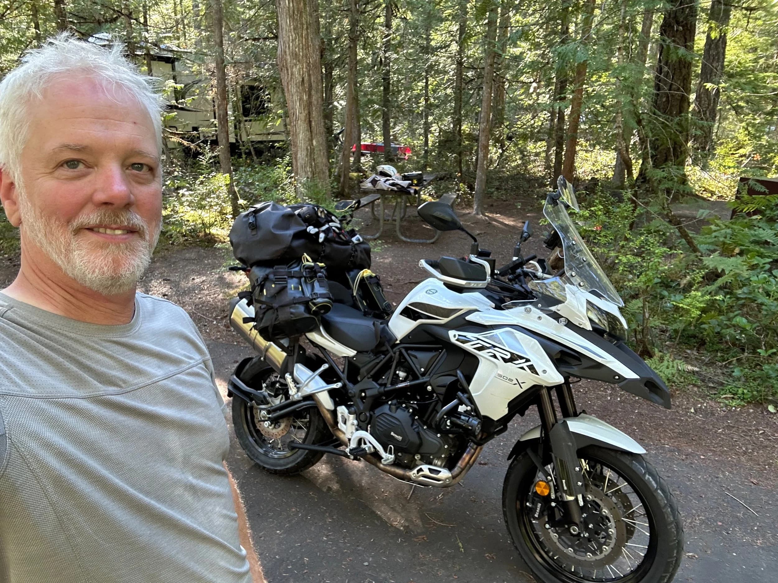 Trip Report: NW National Parks Loop
I left my job recently to take a much needed sabbatical and figure out what I’m doing next. A few weeks after my last day at work I embarked on what was to be a three week tour of NW-ish National Parks from Portland, to include Olympic, North Cascades, Glacier, Yellowstone, Grand Teton, Craters of the Moon, Lassen Volcanic, and Crater Lake.
I ended up missing Grand Tetons due to weather and I had to cut the trip short before I got to Lassen (family medical issue), so Lassen and Crater Lake remain unvisited.
Trip Dates: Sept 3 - Sept 16 (13 days)
Total Travel Miles: 3478 (does not include local miles for store runs, etc.)
Total Gallons of Gas Used: 82
Equipment: 2021 Benelli TRK502X Gaia GPS & Google Maps running on Sonim XP8 rugged Android phoneButler Motorcycle Maps (paper maps of best M/C roads in the country) iPhone 14 (main camera) Akaso Brave 7 helmet-mounted adventure camera Spot X satellite communicator and tracker Wolfman Luggage WP waterproof tank bag and saddle bags (no longer available) Watershed Colorado dry bag duffel (across the pillion seat) Kriega US-5 Drypack (tail bag) Kriega 3L hydration backpack (strapped to duffel, not worn)Marmot Ajax 2 tent Nemo hydrophobic down sleeping bag (non-mummy)Helinox ultralight cot MSR WhisperLite International stove
(Purchased in 1991 for my first moto trip: Detroit, MI to San Diego and back on an XT250)Gossamer Gear Bare Boxer bear-proof food canisters (two - one in each saddle bag)
Day 1 - Olympic National Park Date: Tuesday 9/3/2024
Destination: South Beach Campground, Olympic National Park
Travel Time: 4h 24m
Miles: 213Notes:
Planned to head west to Astoria then north from there, but left later than expected so headed up I-5 to US 12. I’ve driven/ridden that stretch of I-5 hundreds of times (starting in 1993). It’s boring and I hate it.
South Beach CG is first-come-first-served. I didn’t have issue getting a site. There is a long, tight loop of sites along the coastline, but I chose one of the sites further back near the bathrooms due to wind concerns. The bathroom building provided a sort of wind shelter for my site.
I used the heated grips on this leg; it was pretty chilly along the coast in the Olympic Peninsula. I almost didn’t install them, thinking I was being paranoid about the cold. I ended up using them a lot.
Day 2 - Ferry to Seattle / Burien Date: Wednesday 9/4/2024
Destination: Friend’s house in Burien, WA
Travel Time: 7h 30m
Miles: 199
Notes:
Slept well (thanks to Advil PM). I’ve not been sleeping well for more than a year. I’m really hoping to reset my sleep patterns with this trip. A good night’s sleep is one of my great joys and I feel like I’ve been robbed of that pleasure.
Used my Aeropress this morning for the first time ever. I’m hooked.
Headed up along US 101 through Port Angeles and then down to the Southworth ferry terminal near Port Orchard. Ferried across to Fauntleroy, which is just a few miles north my friend’s house in Burien. I’m always surprised at how long it takes to get from the Olympic Peninsula to the east side of Puget Sound (Seattle, etc.). With the ferry crossing (I love ferries) it took seven and a half hours to go 200 miles.
Discovered at my first stop of the day (just up 101 at the Kalaloch Campground, stopped to refill water) that the battery is quite weak and won’t start the bike if you leave the ignition on for even two minutes without the motor running. This would become a theme for the next few days. Fortunately, I have a jumper box and a permanent jump harness wired to the battery so jump starts are a quick operation.
Had a good evening with old friends.
Day 3 - North Cascades via Mountain Loop RoadDate: Thursday 9/5/2024
Destination: Newhalem Campground, North Cascades National Park
Travel Time: 4h 30m
Miles: 146Notes:
Slept well, on the couch. No pills needed.
I realized yesterday that my summer riding gloves (Rev’It Dune) were a size (or two) too small. Rev’It gloves fit really tight and I feel like I can never get it quite right. And yet, I love them. So, I stopped at a Cycle Gear in Bellevue to pick up something summer weight (Dirt 3) that fit better. They’re better, but maybe still one size too small. Such is life.
From Bellevue, I rode north and took the Mountain Loop Hwy then on up north to North Cascades. It was a hot ride. Still summer.
A small section of the Mountain Loop Road is dirt/gravel, which I didn’t realize. No biggie. Was just surprised (clearly I didn’t study my maps closely enough). When riding solo on a bike that weighs over 500 lbs., I tend to avoid planning much off-pavement riding. That’s what my DR-Z is for.
Day 4 - Newport, Washington via Winthrop Date: Friday 9/6/2024
Destination: Golden Spur Motor Inn, Newport, Washington
Travel Time: 8h
Miles: 308
Notes:
Slept just ok, even with Advil PM.
Pretty ride through North Cascades National Park and Colville National Forest. Didn’t do any backroads or hikes. Discovered (new to me) the town of Winthrop. Stopped for coffee at Sheri’s and resupplied on freeze-dried food at Cascades Outdoor Store.
The town of Newport is almost nothing, but, inexplicably, there’s an amazing restaurant (Brownell’s Place). Had dinner and a few ciders. Met and chatted with the owner/chef (she’s great). Listened to some live music. Then back to the motel.
Day 5 - New Battery in Kalispell Date: Saturday 9/7/2024
Destination: West Glacier KOA, West Glacier, MT
Travel Time: 8h 7m
Miles: 293
Notes:
Slept well on motel bed (on sleeping bag, not in the sheets). Another hot one.
Discovered that the water pump seal leaks oil. A quick post in the TRK Facebook group revealed that this is a common problem on this bike, and and easy fix. It’s apparently just a bad o-ring.
Battery has been getting continuously worse, and now requires I jump start the bike about every other start. Google Maps to the rescue: directions to the Batteries Plus in Kalispell, please. They don’t have an Odyssey AGM in the right size; the Duracell will have to do. (It’s been great.)
I set up camp at the West Glacier KOA, which will be my base for a few days. KOAs are their own little world. Very strange. Not really my thing, but the on-site laundry was handy.
After setting up camp I opened a cider and used the iPad to book a vehicle reservation for the next day to ride Going to the Sun Road, which I really wanted to do.
Day 6 - Going to the Sun RoadDate: Sunday 9/8/2024
Destination: Local Ride: West Glacier, Going to the Sun Road, Saint Mary, East Glacier
Travel Time: 5h 35m
Miles: 142Notes:
Quick breakfast and gas up in West Glacier before entering Going to the Sun Road.
Going to the Sun Road was stunning. This was the first point in the trip where I had tingles and was giddy at what I was seeing.
Took a very short hike along Saint Mary Lake. Again, I was beside myself with the beauty.
Lunch at the general store in Kiowa.
The rest of the ride back after East Glacier was meh, but I just kept thinking about how amazing what I’d seen in the morning had been.
Dinner at the KOA. Tacos from a cart (ok / not great, and a very weird guacamole) and a few glasses of wine from another cart. I asked about the guac and it turns out they make it in a food processor. Come on, people.
Day 7 - Ride to BozemanDate: Monday 9/9/2024
Destination: Friend’s house in Bozeman, Montana
Travel Time: ~ 8h (Gaia crashed near the end of the trip, but before getting to Bozeman)
Miles: ~ 400Notes:
Slept poorly again. No pills this time. Took some photos of my soft luggage setup to answer some questions in the TRK502X Facebook group. The saddle bags are from Wolfman Luggage, but I don’t think they make this waterproof line anymore. I use a duffel dry bag from Watershed across the top. A heat shield protects the side bag from exhaust heat.
Hazy, smoky ride most of the way. Very windy in places. This is where I first really started to feel how underpowered the TRK502 is. Really struggled in places.
Developed an engine-speed-sensitive squeak or rattle. Sounds like when a heat shield vibrates in resonance with engine vibration. Discovered that it’s a missing crash bar mounting bolt allowing the crash bar to rub against the frame.
Also noticed that there’s a resonant oscillation at speed that feels like the chain going bad (like it’s stretching unevenly).
First of several nights at a friend’s house in Bozeman (which, it turns out, is a pretty cool town). And there’s a hot tub…
Day 8 - Bike Maintenance & Hyalite ReservoirDate: Tuesday 9/10/2024
Destination: Local Ride: Hyalite Reservoir
Travel Time: not recorded
Miles: not recordedNotes:
Woke up to a smoky sunrise. I had the best night’s sleep I’ve had in years. This is was the whole point of this trip: to untangle my burnout and reclaim sleep as one of my joys. I wrote about it in my journal when I woke up. I hope this wasn’t a fluke.
Planned to replace the bolt that rattled loose from the crash bar, but instead discovered that it had actually severed off at the mount point. No fixing that on the road. Adjusted chain and moved on.
Lunch at Mountains Walking Brewery in Bozeman.
Rode up to Hyalite Reservoir. Pretty ride. Smoky still.
Soaked in hot tub after dinner.
Day 9 - North Yellowstone LoopDate: Wednesday 9/11/2024
Destination: Northern loop through Yellowstone National Park
Travel Time: 9h 36m
Miles: 272Notes:
Did a day trip from Bozeman down through the northern loop in Yellowstone, entering at Mammoth and taking the scenic route through Paradise Valley.
Saw elk, coyotes (I think), buffalo, and pronghorn.
Pretty ride, but cold in places. Used heated grips again.
Rode the loop through Mammoth Hot Springs (see video) at the end.
Coffee at Tumbleweed Bookstore & Cafe in Gardiner. I kind of dig Gardiner. Good vibe.
Had dinner at Mountains Walking Brewing. Rain and wind started. Lights flickered. Waited for rain to stop before riding back to the house.
Power out at the house due to high winds. This does not bode well for tomorrow.
Day 10 - Winter Weather in the ParksDate: Thursday 9/12/2024
Destination: Grand Teton National Park via West Yellowstone Pocatello, Idaho
Travel Time: 5h 40m
Miles: 201Notes:
Today was supposed to be a gorgeous ride through Yellowstone into Grand Teton National Park, and camping at Signal Mountain CG in the park. The weather had other ideas. It was pouring rain (and cold) all the way to West Yellowstone from Bozeman. By the time I got to West Yellowstone I was getting severe winter weather warnings on my phone calling for up to 3 (three!!) inches of snow accumulating in the high passes in the park. It’s bad enough in a car, but that’s a disaster waiting to happen on a motorcycle.
I parked my butt at Mountain Mama’s Cafe in West Yellowstone to warm up / dry off and decide what to do. I almost had myself convinced to push through when I realized that, even if I made it to the campground ok, I’d be setting up camp in the rain and I’d likely be miserable all night. Grand Teton would have to wait.
From West Yellowstone it’s easy to bail west into Idaho and get away from the park weather and elevations. So that’s what I did. It was not a pleasant ride, though. I was in torrential downpours all the way to Idaho Falls.
Arriving in Idaho Falls, I was exhausted and sure I could just find a room for the night. I dropped the bike at a roundabout (short-legged it coming to a stop; I knew it was going so I just rolled away). Guy behind me helped me pick it up. Then, there were no rooms because it was move in week for the two universities there (U of I, ISU). This would become a recurring theme.
I rode further to Blackfoot. Still no rooms.
I called ahead to Pocatello and got a room at a Red Lion there. I was never so happy to be off the bike.
No pictures this day. I couldn’t even get the action camera to turn on.
Day 11 - Craters of the Moon and EBR-1Date: Friday 9/13/2024
Destination: Craters of the Moon National Monument
Travel Time: 4h 20m
Miles: 124
Notes:
I wasn’t sure what my destination would be today but my plan was to do a little nuclear tourism, see Craters of the Moon, and then go somewhere from there. My schedule and day-plan was thrown off by missing Grand Teton National Park and spending a night in Pocatello, which was not on the itinerary at all.
Stopped in Atomic City. Not sure why; I was under the impression that Atomic City was the first city lit by nuclear engergy, but it was practically a ghost town. There are a few houses there, but as far as I could tell all of the business were shuttered. Except, maybe, for the race track; that looked like it might still get used.
Arco, it turns out, is the city celebrated as the first in the world to be lit by nuclear energy. Nothing special about the town, but they do a nice job of making City Hall photo-worthy.
Between Atomic City and Arco is EBR-1 (Experimental Breeder Reactor I) which was the world’s first breeder reactor. The EBR-1 exhibit was closed for the season, but in the lot next to it were some really interesting experimental nuclear heat-transfer jet engines that never made it out of the experimental phase (probably a good thing).
Craters of the Moon is pretty small. If you don’t do any of the walks, it’s literally just a 30 minute road loop. Still, it was an unexpected surprise and delight. I had no idea what to expect but I was positively chuffed at the experience. I noticed that the campground had open sites so I inquired at the entry booth. As luck would have it, the whole campground is first come / first serve. I decided to set up for the night. It’s good to be done early and have some time to read and not stress about making distance.
Day 12 - New Chain in Twin FallsDate: Saturday 9/14/2024
Destination: Battle Mountain, Nevada
Travel Time: 8h 52m
Miles: 335
Notes:
Beautiful morning in Craters of the Moon. While I was breaking camp a parade of classic cars came into the park to drive the loop. I got a picture of one Pontiac down the road in Carey at a gas station.
Carey ended up being an unplanned fork in the road for me. I discovered this morning that my chain was indeed stretching unevenly, and the oscillation I was feeling and hearing was the chain hum changing from a “loose” hum to a “tight” hum rapidly as the tight spot moved around the sprockets. I was supposed to continue west to Mountain Home and then south from there into Nevada. A very scenic route, according to my Butler map. But, between camp and the gas station I got pretty paranoid about the chain snapping at high speed, which, worst case, could lead to a fatal crash.
So I called ahead to a few motorcycle dealers in Mountain Home (on my planned route) to see if they could take me in and replace the chain. No dice. This is the downside of having an obscure motorcycle from an obscure marque - no one wants to work on it. Making matters worse this is an Italian-designed bike built in China, a fact which causes many people to lose the ability to think clearly. “It’s Chinese junk!” Not so. Next.
With Mountain Home out, I tried Twin Falls. My first call was to Adventure Motorsports, and the service manager there took me in with no hesitation. “How soon can you be here?” I didn’t get his name, but my hat’s off to him and his one tech working furiously on a Saturday to beat the 3pm closing time. He said during high season, they get about 15-20 out of town travelers per week who need something done, and they take them all in. I love to hear stuff like this. This shop is in it for the community. They have a nice showroom, too.
With a quality new chain installed, I got a burrito and a MexiCoke at a Mexican place and went on my way. I made it to Battle Mountain, NV, where I decide to get a room. Tomorrow I rejoin my planned scenic route. Day 13 - Desert Mountains in NV, CADate: Sunday 9/15/2024
Destination: Grizzly Campground, Lake Davis (near Portola, CA)
Travel Time: 7h
Miles: 307
Notes:
I love the northern Nevada landscape, and today’s ride didn’t disappoint. US Highway 50 is apparently known as “The Loneliest Highway” but everyone knows about it, so it’s not very lonely. However, after leaving Austin, NV headed west you can take Nevada Highway 722, which dips to the south and follows the old US 50 route. It was completely empty and the twisties through the passes were fun. Highly recommended.
Stopped in Fallon for gas and to find a Micro SD card for the action camera. Walmart to the rescue.
After Reno, I crossed into California and, I swear, it looks different. Norther California desert mountains are so beautiful.
Camped at a nearly empty campground on Lake Davis (very end of the season). The host warned me rain was coming tomorrow.
Day 14 - Unplanned Return HomeDate: Monday 9/16/2024
Destination: Summit Lake Campground, Lassen Volcanic National Park Portland, Oregon (Home)
Travel Time: 10h 32m
Miles: 538Notes:
Last week, my mom went into the hospital for a fairly routine procedure. My brother went to Michigan to help out, as needed, and he went back home to Arizona after she returned home and everything seemed settled.
This morning, while having coffee, I got a call that she’d gone back into the hospital with something that may or may not have been related to the procedure. It seemed like maybe things were ok, but maybe not.
I decided the best thing to do was head home so that I was near an airport if I needed to fly out to Michigan to help out.
I packed up camp and headed up US 395 toward home, via Klamath Falls. It was a pretty ride, but, once again, I found myself in rain most of the way to Klamath Falls.
I was pretty beat by the time I got to Klamath Falls and figured I’d just find a hotel room, get a hot shower, and finish the ride tomorrow.
But, once again, it was move-in week for the local university. Holiday Inn Express had a single room for $395. No thanks. Onward.
I never hit rain again after Klamath Falls, and after turning west onto Oregon Hwy 58 and starting to lose elevation into the Willamette Valley, the temperature starting rising, which was welcome.
Once I reached Eugene, there was no point in not just going all the way home, so that’s what I did.
I got two pictures: one at camp before the call, and one at my last gas stop, an hour and twenty minutes from home, with the moon rising.
A nice side effect of my early return home is that I was home for my birthday (tomorrow), so I had dinner with my kids and my wife, which was lovely.
I did end up flying to Michigan the next day, and was there for a bit. The best part? I got to make some meals for my mom and step dad. Everything seems ok with my mom for now.
Grand Teton, Lassen, and Crater Lake will be there, and now I have an excuse for another trip in the future.