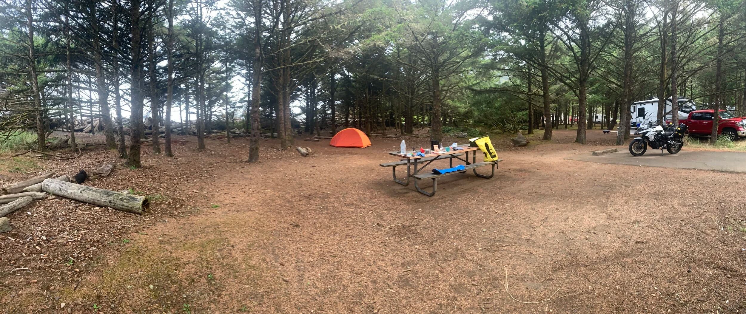 Trip Report: Portland to Olympic Peninsula to Orcas Island
If you follow me on Instagram, you know I purchased a 2021 Benelli TRK502X in July. I just completed my first overnight trip with the new Benelli, doing 7 nights / 8 days from Portland, up the Olympic Peninsula, over to Bellingham and then finally to Orcas Island.
The plan was to camp most or all nights until my last two nights on Orcas, where I had a small waterfront cottage rented right in Orcas Village, where the ferry lands. After three nights of camping, however, I realized I can’t really do the “thin air pad on the ground” thing anymore (I’d be 50 in a week, after all!). My back was killing me and I was not sleeping well, making the following day’s ride less enjoyable at best, and probably also less safe.
So, instead of 5 nights of camping, I did three and then found a cheap motel in Port Angeles, figuring I’d camp the next night and then do my two nights in the cottage. As it happened, most of the next day was rain and the forecast was rain all night and into the morning, so I ended up in a hotel in Bellingham to avoid setting up and breaking down camp in the rain. I can do it. Have done it. But if money is no object and there is lodging available, why be miserable?
The route I planned was intended to get me familiar with the TRK’s manners while allowing for the fact that I’d be riding solo and really didn’t want to get into trouble that I couldn’t get myself out of. The 502X, despite being a 500cc bike, is not light. Curb weight is listed as 518 lbs (dry is 470). So, I favored two lane highways, but included some backcountry single lane roads that were a mix of pavement and gravel.
Here’s my trip report. Day 1Planned / Actual Destination: Cape Disappointment State Park
Planned / Actual Accommodation: Camping
Planned / Actual Miles: 201 / 212
Planned Route: Tigard to Seaside via the Nestucca River Backcountry Byway; Seaside to Cape Disappointment via US 101.
Route NotesI let Google guide me to Carlton from Tigard (home base). On Gaia GPS, I had planned a route that followed the Nestucca River Backcountry Byway from Carlton to Beaver. Unfortunately, there was a detour after McGuire Reservoir (the body of water at the left edge of the right third of the map above) that took me well south down to Bell Mountain along Bald Mountain Rd before heading back north again and rejoining the Nestucca River Rd near Thune Mouintain. Basically, I missed at least half of the scenic route I was hoping for. I wasn’t sure how far the closure went on Nestucca River Rd, and I was still getting the hang of using Gaia to both see where I was, and plan where I wanted to go…so I just followed the signs for the detour. The detour was nice, but it wasn’t the Nestucca River . Most of the route was paved single lane forest road, with a small section of gravel thrown in before the detour.
Once to Beaver, I just rode south on 101 until I saw the signs for Pacific City. Lunch at Pelican Brewery. (I’m not a fan of their new orange grate picnic table outdoor seating.)
After lunch, I rode straight up 101 through Astoria and across to Ilwaco, where I had a reservation to camp at Cape Disappointment. Great spot, right up against the beach (with some trees and brush to break the wind). Camp NotesCape Disappointment was filled mostly with campers pulled by pickup trucks, and my site was nestled between two of them. Most people were friendly. The guy on the north side came over right away to ask about the bike. He’d never seen or heard of Benelli. The guy on the south side came over several times. It’s like he kept looking for excuses to come over and talk more. He even offered me dinner (red beans and rice, with sausage). I accepted. The next morning, he came over with pictures of places I should see in Olympic National Park. The wife of the guy on the north side came over just before I departed for the day’s travels. “Looks like a lot of fun. Nice bike. Reminds me of when we used to backpack. Now we have this thing,” (she gestured to her trailer).
The site itself was great. It was wooded, and sheltered from the beach winds with a thin band of trees and brush, plus a wall of driftwood you had to navigate through and over to get to the beach. The beach itself was gorgeous. Gear NotesI’d read that my trusty MSR Whisperlite Internationale (purchased in 1991) can run on unleaded gasoline just as easily as white gas. Since this kind of moto touring is about going as light and simply as possible, I figured I’d just run unleaded gas instead of bringing white gas. This way, I’d have 1.5 liters of spare gas plus whatever was in my stove bottle in the event that I ran out of gas on the road. Seemed like a great idea.
The reality, as I found out, is that gasoline burns very dirty compared to white gas. It lit, no problem, but the stove was left covered in black soot after a single burn and everything ends up smelling like gasoline. I never realized how much I’d want to smell white gas. So, next trip I’ll ditch the gasoline and go back to white gas.
Also, I threw out my deodorant and body soap before bed. Because I’m using soft bags (not hard aluminum cases) all of my food, toothpaste, and other smelly items need to fit into a small bear canister that fits inside one of my soft bags (keeps rodents out, even if there are no bears). To save space, the stove needs to fit in the bear canister, too. The deodorant and soap simply didn’t fit. So, off they went. Besides, I use Dr. Bronner’s as my dish soap. If I found a shower, I could use that.
Day 2Planned / Actual Destination: South Beach Campground
Planned / Actual Accommodation: Camping
Planned / Actual Miles: 231 / 219
Planned Route: Cape Disappointment up around the Long Beach Peninsula, to South Beach Campground via Raymond, Grayland, Aberdeen, Moclips, Lake Quinault (I skipped the loop around the Long Beach Peninsula)Route NotesToday was a very nice ride. Two lane highway all the way, with a good chunk of it along the coast. I had planned to do a loop up the Long Beach Peninsula, but decided to skip it to save time after spending some time in the morning exploring Cape Disappointment State Park. My destination, South Beach Campground, is first come / first serve and I wasn’t sure how busy it would be, so I didn’t want to arrive too late.
Finding lunch turned out to be a problem. I was avoiding sketchy looking places because the mask wearing seemed to be a problem. I wasn’t looking for conflict. Along the way I discovered the town of Seabrook, which appears to be a vacation shopping mall built specifically to separate you both from reality and your money. Not my kind of place, though I did look to see if there was a place I could eat. Everything looked too fancy for me to roll up in my full moto suit and boots. Where’s a good taco truck when you need one?
I ended up eating in a gas station convenience store (You and I Market) parking lot in Pacific Beach, just up the road from Seabrook with a bunch of day laborers picking up their afternoon tallboys. Gear NotesFor day two, I used Gaia GPS’s route planning feature to set my path to South Beach. It’s quite easy once you figure out the combination of gestures and long-presses (I needed a YouTube video). One caveat is that you either need a data connection (Wi-Fi or mobile data) to be able to do it (if you want the route to snap to a road or trail, which is quite handy), or you need to have downloaded all the map areas and route planning data ahead of time. Ordinarily, this wouldn’t be a problem, but I had brought along two phones: my iPhone (which is my regular phone) for pictures and communication (it would ride in my chest pocket); and Goggle Pixel 3 I’d purchased to use only for navigation (it would be mounted to the handlebars). I don’t have data for the Pixel.
This turned out to be a problem because I hadn’t downloaded all the map areas and route planning data for my trip onto the Pixel (whereas I had downloaded it all to the iPhone). So, I switched to navigating (still with Gaia GPS) on my iPhone and taking pictures with the Pixel for this leg of the trip, hoping I’d get good Wi-Fi at some point which would allow me to download the data I needed onto the Pixel so I could switch back.
This single day of using the iPhone as my navigation device fried the camera. Two days later, Apple published this.
I still really like having two phones on a trip. (I also have a Spot X satellite communicator for off-grid communication.) It’s nice to have one in the pocket that can come out for a quick picture. It’s also nice to have an emergency backup. It would be nice to have a data plan for the nav phone. Short of that, I just need to be better about downloading map areas and routing data ahead of time (and not using my iPhone for nav). Camp NotesSouth Beach Campground is right on the water, and it’s first-come, first-served. The weather was good, and I felt lucky to get a spot. There were several spots available as it turned out. As I was riding around trying to choose which spot to take, there was a couple with a pickup camper waving me in next to them. This was a first. “We ride!” they exclaimed. So that’s where I set up camp.
The guy’s name was Steve Miller. He sells CBD products online. Seems on brand. They were an amazingly friendly couple, actually. Both ride BMW’s and Steve, especially, was really curious and enthusiastic about the TRK. The bike was really turning out to be a conversation starter. He came over several different times while I was setting up camp and making dinner to ask questions or share info about riding groups he’s a part of. It was really quite welcome.
In the morning they gifted me some carrot zucchini bread for breakfast and then broke camp and pulled out well before I did.