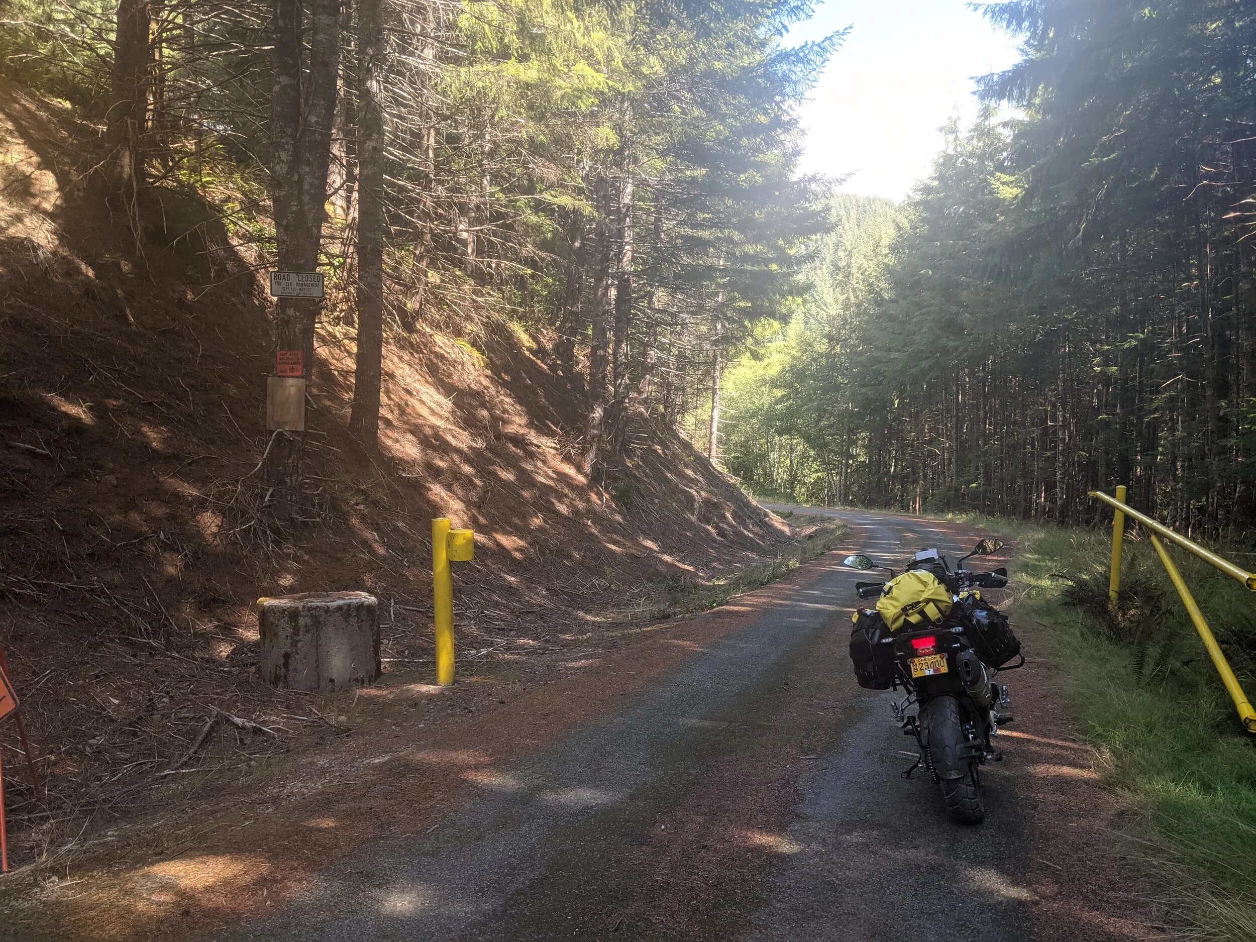 South Beach to Hoh Rainforest
This is the second installment of my trip log of my first overnight trip with the new Benelli TRK502X, doing 7 nights / 8 days from Portland, up the Olympic Peninsula, over to Bellingham and then finally to Orcas Island.
Day 3Planned Destination: Forks or La Push
Actual Destination: Hoh Rainforest Campground
Planned / Actual Accommodation: Camping
Planned / Actual Miles: 100 / 111
Planned Route: Follow the Oly Ride Guide Day Three route published by ADV Pulse, and camp somewhere near Forks or La PushRoute NotesAfter breaking camp I headed south to Queets to get gas and then back up US 101 to the store at Kalaloch to buy a sandwich for lunch for the day and pick up a few beers for the evening. I’d actually had trouble finding a place that was open and that sold beer the night before, so I was going into this day better prepared.
Today’s route was planned to be basically all of the Day 3 section of the ADV Pulse’s Olympic Peninsula route. No specific place planned to camp. I’d just find something when I was done for the day. The day started out well, and I got my first introduction to gravel roads and gravel two track on the TRK. After my experience on the WABDR on the Quota (which I haven’t written about, but I crashed hard; the Quota is in the garage patiently waiting to be rehabbed now), I was taking things slow and easy. The TRK isn’t that much lighter than the Quota, even though it’s half a liter smaller engine-wise, and I’m not sure yet if I can pick it up, so I didn’t want to get too excited and get myself into trouble again. Plus, I’m running the 80/10 Metzler Tourance tires that came on the bike; slow and easy.
I did build some confidence, but I never pushed hard. I thought about this a lot as I was riding actually. I mean, I could have pushed a lot harder. Why wasn’t I? The answer is simple. For me, adventure motorcycling (well, life in general) is about making moments. It’s about stringing together as many great memories as I can while I still can. I’ll remember the great views I “discover” along the way. I’ll remember the interesting people I meet. I’ll remember the trip. But I won’t remember if I pushed hard on any given day or not. I just don’t care about that anymore. Plus, when riding alone, you’re alone if you get into trouble. Better to go easy and get there in one piece.I did run into one issue along the way; the C-2000 road was closed. It appeared that my planned route was closed for the season, which hadn’t been noted in the ride guide. So, I backtracked to the Hoh Mainline Road and rejoined the planned route where Mainline meets Maple Creek Rd. I discovered later, upon closer inspection, that I’d actually missed a turn off of C-2000 (onto a road that isn’t labeled on the map) just before the road closure. Not sure how I rode past that turnoff twice without seeing it. So be it. I have an excuse to go back and do that again. It was all still great riding. Camp NotesIt’s been a while since I camped on the ground on a thin air pad, and it wasn’t really agreeing with me anymore; I hand’t slept well the last two nights. By the time I got to the Hoh Visitor Center I was tired and ready to be done. The Hoh Campground is reservation only, and there were no sites available when I was planning the trip. But, there was a sign at the visitor center beckoning visitors to inquire at the campground desk if there were any camp sites available, so that’s what I did.
I lucked out; there were several sites available. I got a great site with a somewhat secluded tent space (though I worried about tent flooding as it was several feet lower than the surrounding land; fortunately there was no rain). I met a young couple who were actually sleeping in their car. Ouch. They didn’t really know how to camp. She was from Texas but had recently moved to Eugene, Oregon, and he was from England somewhere. She said she was an artist and she’d never done anything like this before. In the morning, she came over and asked if I had a way to heat water so they could have coffee. I obliged.
The guy next to me also came over in the morning and offered me coffee. Motorcycle travel really brings out the friendliness from people in RV trailers. Gear NotesI had noticed a store on the road up to the Hoh visitor center. I rode back to see if they had any food, as I was running low. I hadn’t really been thinking ahead and replenishing food before I needed it, and I was worried that I’d run out. The store had several freeze dried meals, so I picked up something for dinner and some scrambled eggs for breakfast, leaving the food I already had for the next day.
I didn’t have a ton of room for food as I was storing all food (and smelly items) in a small Bare Boxer bear canister from Gossamer Gear. Since I wasn’t running with hard case luggage, I felt I needed a way to keep the rodents (and bears) at bay. The Bare Boxer has room for two days of dinners and breakfasts (freeze dried) plus coffee, some extra oat meal, energy bars, my toothbrush & paste, the dish soap, DEET, and my Whisperlite stove. It worked out quite well the entire trip, actually. Anything that might attract rodents or bears went in the canister, and the canister fit nicely at the bottom of my left-side Wolfman 20L rolie.
As noted above, sleeping on the ground on a thin air pad doesn’t do it for me anymore. My back killed me on the third night, and I did not sleep well at all. I have identified the solution, however. The Helinox Lite Cot. It packs smaller than my air pad and is now on my Christmas wish list. The only downside would be cold weather camping; will need a thin foam pad to provide insulation for temps below freezing, likely.