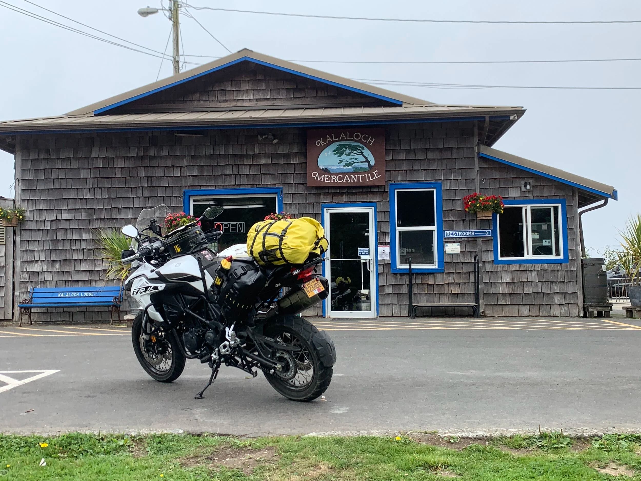 South Beach to Hoh Rainforest
This is the second installment of my trip log of my first overnight trip with the new Benelli TRK502X, doing 7 nights / 8 days from Portland, up the Olympic Peninsula, over to Bellingham and then finally to Orcas Island.
Day 3Planned Destination: Forks or La Push
Actual Destination: Hoh Rainforest Campground
Planned / Actual Accommodation: Camping
Planned / Actual Miles: 100 / 111
Planned Route: Follow the Oly Ride Guide Day Three route published by ADV Pulse, and camp somewhere near Forks or La PushRoute NotesAfter breaking camp I headed south to Queets to get gas and then back up US 101 to the store at Kalaloch to buy a sandwich for lunch for the day and pick up a few beers for the evening. I’d actually had trouble finding a place that was open and that sold beer the night before, so I was going into this day better prepared.
Today’s route was planned to be basically all of the Day 3 section of the ADV Pulse’s Olympic Peninsula route. No specific place planned to camp. I’d just find something when I was done for the day. The day started out well, and I got my first introduction to gravel roads and gravel two track on the TRK. After my experience on the WABDR on the Quota (which I haven’t written about, but I crashed hard; the Quota is in the garage patiently waiting to be rehabbed now), I was taking things slow and easy. The TRK isn’t that much lighter than the Quota, even though it’s half a liter smaller engine-wise, and I’m not sure yet if I can pick it up, so I didn’t want to get too excited and get myself into trouble again. Plus, I’m running the 80/10 Metzler Tourance tires that came on the bike; slow and easy.
I did build some confidence, but I never pushed hard. I thought about this a lot as I was riding actually. I mean, I could have pushed a lot harder. Why wasn’t I? The answer is simple. For me, adventure motorcycling (well, life in general) is about making moments. It’s about stringing together as many great memories as I can while I still can. I’ll remember the great views I “discover” along the way. I’ll remember the interesting people I meet. I’ll remember the trip. But I won’t remember if I pushed hard on any given day or not. I just don’t care about that anymore. Plus, when riding alone, you’re alone if you get into trouble. Better to go easy and get there in one piece.I did run into one issue along the way; the C-2000 road was closed. It appeared that my planned route was closed for the season, which hadn’t been noted in the ride guide. So, I backtracked to the Hoh Mainline Road and rejoined the planned route where Mainline meets Maple Creek Rd. I discovered later, upon closer inspection, that I’d actually missed a turn off of C-2000 (onto a road that isn’t labeled on the map) just before the road closure. Not sure how I rode past that turnoff twice without seeing it. So be it. I have an excuse to go back and do that again. It was all still great riding. Camp NotesIt’s been a while since I camped on the ground on a thin air pad, and it wasn’t really agreeing with me anymore; I hand’t slept well the last two nights. By the time I got to the Hoh Visitor Center I was tired and ready to be done. The Hoh Campground is reservation only, and there were no sites available when I was planning the trip. But, there was a sign at the visitor center beckoning visitors to inquire at the campground desk if there were any camp sites available, so that’s what I did.
I lucked out; there were several sites available. I got a great site with a somewhat secluded tent space (though I worried about tent flooding as it was several feet lower than the surrounding land; fortunately there was no rain). I met a young couple who were actually sleeping in their car. Ouch. They didn’t really know how to camp. She was from Texas but had recently moved to Eugene, Oregon, and he was from England somewhere. She said she was an artist and she’d never done anything like this before. In the morning, she came over and asked if I had a way to heat water so they could have coffee. I obliged.
The guy next to me also came over in the morning and offered me coffee. Motorcycle travel really brings out the friendliness from people in RV trailers. Gear NotesI had noticed a store on the road up to the Hoh visitor center. I rode back to see if they had any food, as I was running low. I hadn’t really been thinking ahead and replenishing food before I needed it, and I was worried that I’d run out. The store had several freeze dried meals, so I picked up something for dinner and some scrambled eggs for breakfast, leaving the food I already had for the next day.
I didn’t have a ton of room for food as I was storing all food (and smelly items) in a small Bare Boxer bear canister from Gossamer Gear. Since I wasn’t running with hard case luggage, I felt I needed a way to keep the rodents (and bears) at bay. The Bare Boxer has room for two days of dinners and breakfasts (freeze dried) plus coffee, some extra oat meal, energy bars, my toothbrush & paste, the dish soap, DEET, and my Whisperlite stove. It worked out quite well the entire trip, actually. Anything that might attract rodents or bears went in the canister, and the canister fit nicely at the bottom of my left-side Wolfman 20L rolie.
As noted above, sleeping on the ground on a thin air pad doesn’t do it for me anymore. My back killed me on the third night, and I did not sleep well at all. I have identified the solution, however. The Helinox Lite Cot. It packs smaller than my air pad and is now on my Christmas wish list. The only downside would be cold weather camping; will need a thin foam pad to provide insulation for temps below freezing, likely.